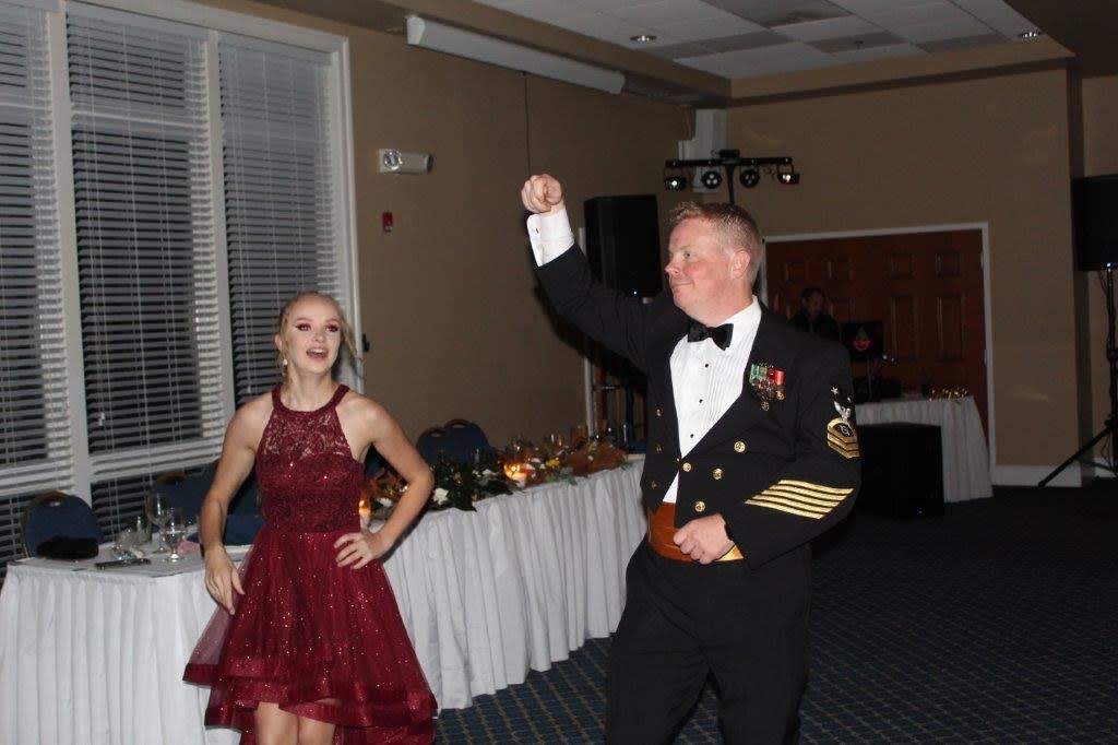 Master Chief Petty Officer dancing with his beautiful daughter at the 2019 Navy Ball
